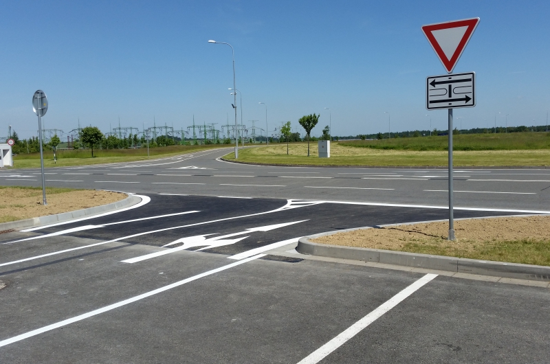 SECOND ENTRANCE TO THE PRODUCED CARS PARKING